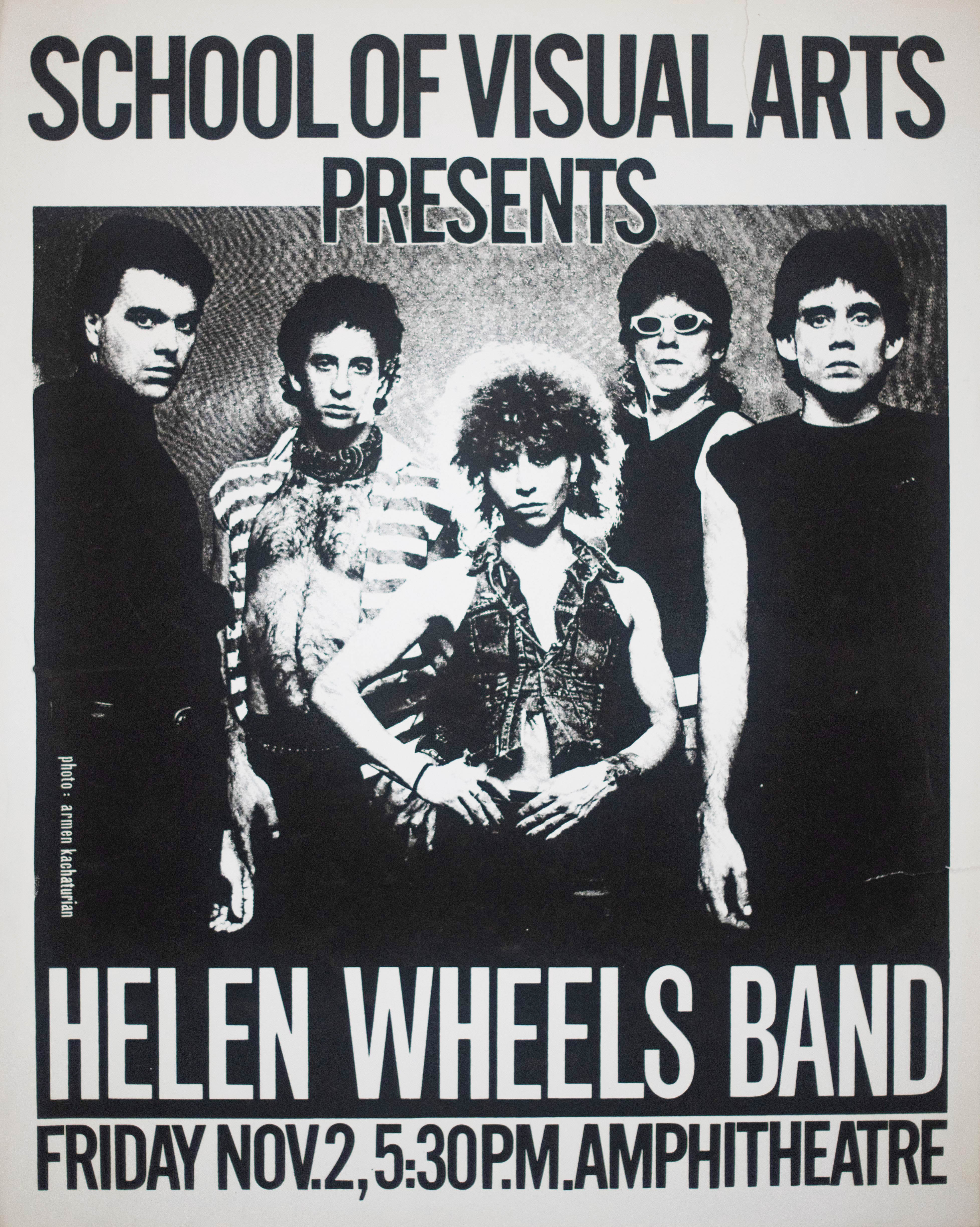 portrait of a punk band with 4 men and one petite woman